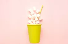 Creative concept still life food diet health photo of take away drink beverage cup full of sugar with straw on pink background.