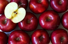 Background of red delicious ripe apples