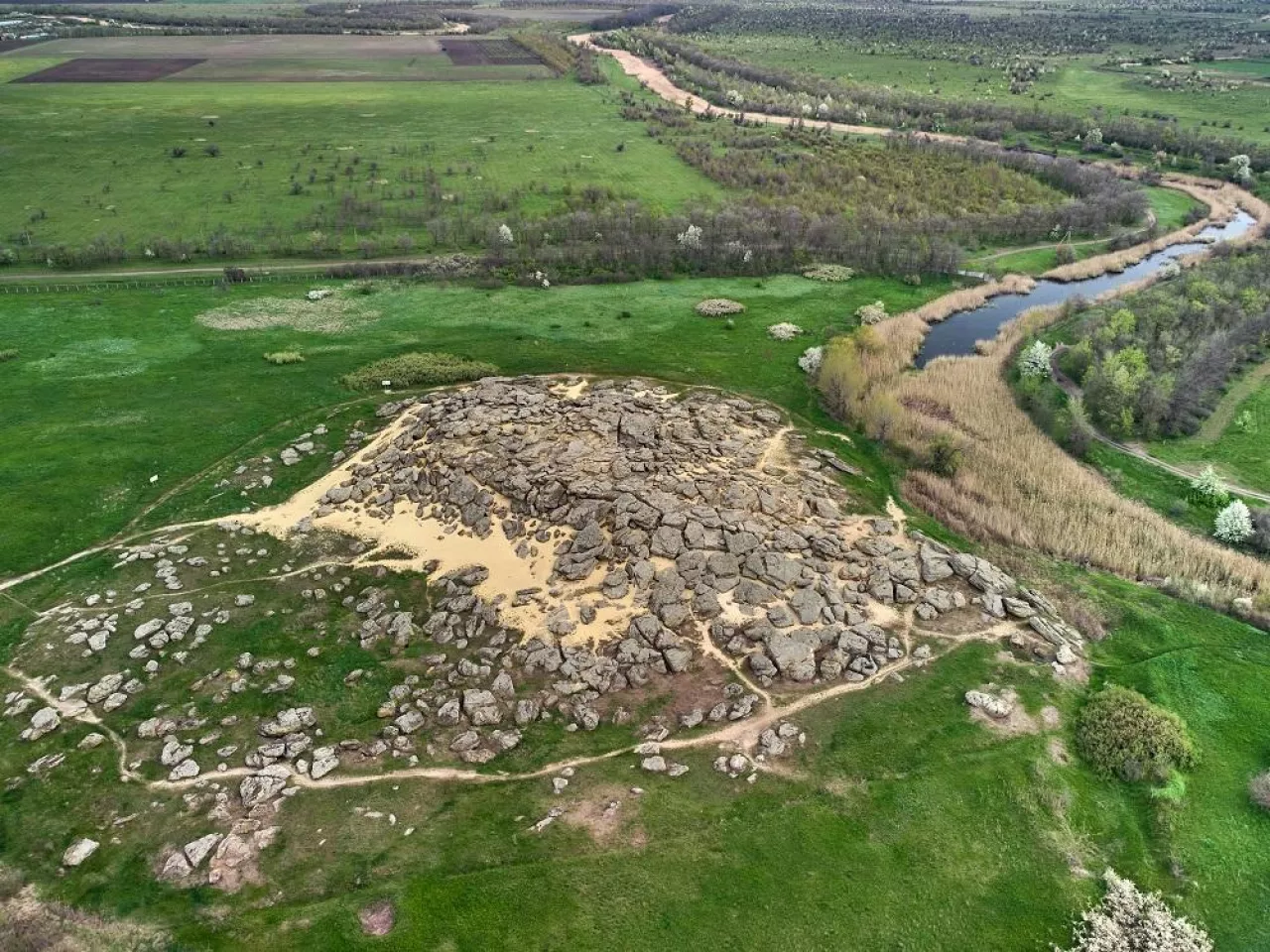 Aerial top view of big stones named Kamyana Mohyla, Melitopol Ukraine, sunny day