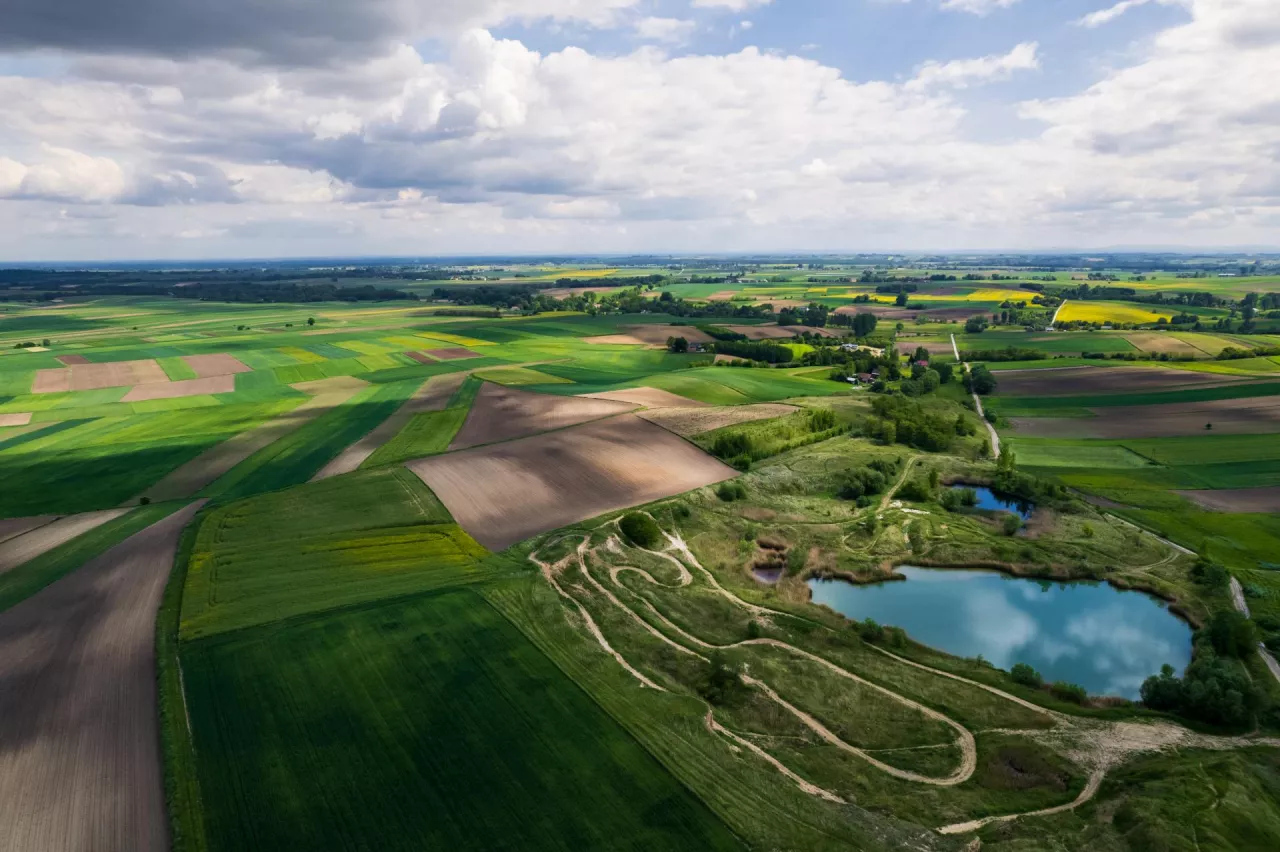 Green Countryside Landscape at Spring. Drone Aerial View. Poland Farmlands.