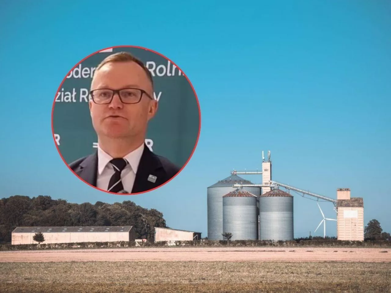 silosy i twarz dyrektora Warmińsko-Mazurskiego Oddziału Regionalnego ARiMR